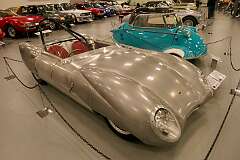 Launceston, Tasmania, Australia - A 1956 Lotus Eleven, 'Club' specification, with a Coventry Climax engine. Behind it is a 1958 Messerschmitt KR200, powered by a Fichtel & Sachs single cylinder 191cc engine, producing 10 horsepower. The 230kg three-wheeler had a top speed of more than 90 km/h.