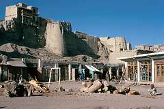 Shops around a small square in the bazaar below the crumbling Citadel, the fort of Ghazni.