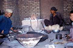 Making brass ornaments in a small workshop in Herat.