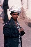 A porter boy of the village of Islam Qala, at the border with Iran. There are always boys like this waiting to carry loads to and from trucks.