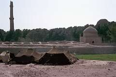 Tents of Kuchi nomads are perched near four broken minarets, all that remains of a “madrassa”, an Islamic religious school near Herat, destroyed by the British in 1834.