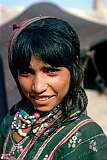 A girl of the Kukchi people, a nomadic group camped on the outskirts of Herat.