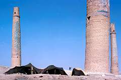 Tents of Kuchi nomads are perched near the four broken minarets, all that remains of a “madrassa”, an Islamic religious school near Herat, destroyed by the British in 1834.