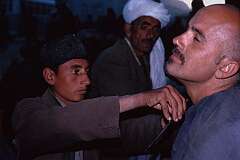 Getting a shave in Kabul.