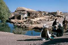 The village of Farahrud, on the road between Herat and Kandahar is built next to a small stream that provides it with essential water in an otherwise barren landscape.