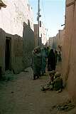 One of the many narrow alleys in the old city of Kandahar. Most women wear the all-enveloping “burqa” outside the house in this conservative society.