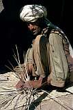 A man weaving a reed mat in Kandahar, southern Afghanistan.