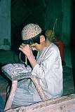 In this workshop in the southern city of Kandahar stone beads were made and young boys were laboriously drilling small holes through these beads with a primitive hand-drill.