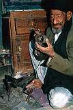 A silver smith in one of the many tiny workshops in Kandahar. Beautiful pieces are produced with simple tools.