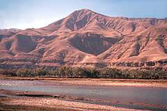 Mountain scenery  and river on the road to Pul-e-Khumri, between Kunduz and Kabul.