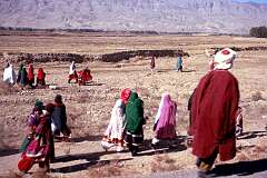 People on the way to a buzkashi match near Pul-e-Khumri, between Kunduz and Kabul, northern Afghanistan.