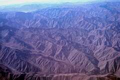 Above the Hindu Kush mountains.