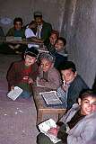 In one of the small open “madrasas” or koran schools boys are learning to recite the Holy Qur'an in this deeply religious Muslim society