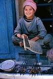 Kebab, meat roasted on skewers and grilled over hot coals, is something of a national dish and could be bought from, often very young, sellers like here in Mazar-e-Sharif.