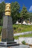 The monument, inscribed in Hindi and Tibetan, commemorating the establishment of the Gontse Gaden Rabgyel Ling Monastery, featuring the Ashoka lion symbol of India.