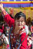 Young women perform a group dance.
