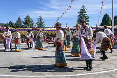 Students perform a Tibetan group dance, depicting agriculture.