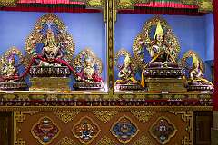 Gilded images of bodhisattvas in the main assembly hall of the Thupsung Dhargye Ling (TDL) Monastery.