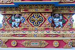 Detail of the elaborate decorations, showing Tibetan snow lions and the dorji (thunderbolt) on a chorten (stupa) at Thupsung Dhorgye Ling Monastery.