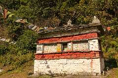 A wall with sacred inscriptions, just west of Thembang Heritage Village, considered as the most ancient village in the region.