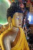 The 8Shakyamuni Buddha statue in the main assembly hall, Tawang Monastery.