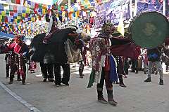 Dancing “yaks” with masked dancer in the Carnival Parade on the first day of the Tawang Festival.