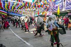 Masked dancers, in the Carnival Parade on the first day of the Tawang Festival.