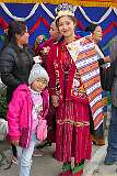 The Festival Queen in traditional Monpa dress posing after the Carnival Parade of the Tawang Festival.