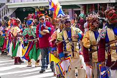 Masked temple dancers, in the Carnival Parade on the last day of the Tawang Festival.