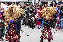 The Carnival Parade, with many colourful dancers, on the last day of the Tawang Festival.