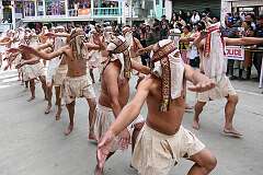 The Carnival Parade, with many colourful dancers, on the last day of the Tawang Festival.