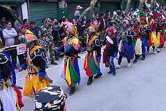 The Carnival Parade, with many colourful dancers, on the last day of the Tawang Festival.