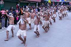 The Carnival Parade, with many colourful dancers, on the last day of the Tawang Festival.