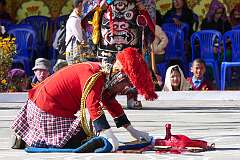 A masked “clown” providing light relief during a spiritual dance at the Torgya.