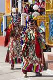 Masked dancers walk from the main hall of the Monastery to the dancing ground.