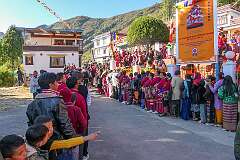People lining up to go inside the monastery for the “initiation of the White Tara” ritual, at the end of the third day of the Torgya ceremony.