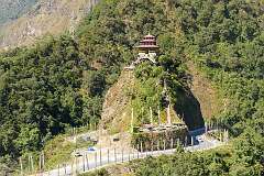 View to the Dul Dul Tharpa Ling Gompa, a Buddhist temple, from the Chariduar-Tawang Road.