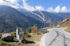 The Chariduar-Tawang road, with prayer flags, 37 kilometres northwest of Dirang, at 2,967 metres altitude.