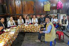 The couple and wedding guests in the house of the Radhe clan, during the Eli ceremony, Tajang.