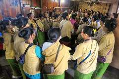 Apatani women singing and dancing in the house of the Radhe clan, at the wedding party during the Eli ceremony.