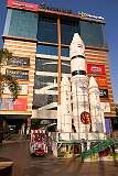 A model of an Indian space rocket in front of Cinépolis Shopping Centre on GS Road (Guwahati-Shillong Road).