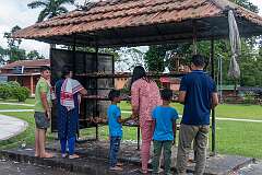 Bringing offerings at the temple precinct in Sivasagar.