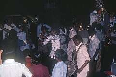 Drummers at a Baraat wedding procession leading the groom on a horse, in Paharganj, Central Delhi.
