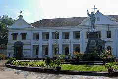 The Archbishop's Palace, (Paco Patriarcal), the residence of the Archbishop of Goa, , with a statue of "Christ the Redeemer" in front.