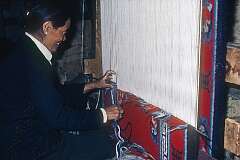 Weaving a carpet in a workshop at the Tibetan Children's Village in McLeod Ganj, with its Tibetan population.