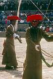 Dance by two men, one with a mask, in the Lhamo, Tibetan Opera, performance.