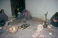 Abdul Aziz Khan's family making Papier-mâché boxes; this technique, using paper pulp to make objects, was first brought to Kashmir from Persia in the 14th century..