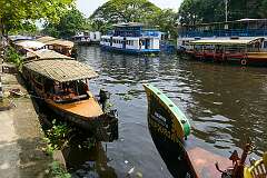 Boats along Finishing Point Road, near Haveli Backwater Resort, in Thathampally, Alappuzha.