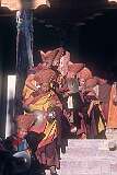 Monks with cymbals on the steps leading into Hemis Gompa.