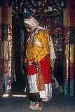 A masked dancer in a ceremony inside Hemis Gompa.